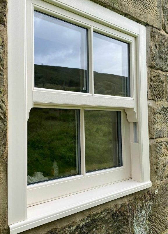 white upvc Victorian sliding sash window