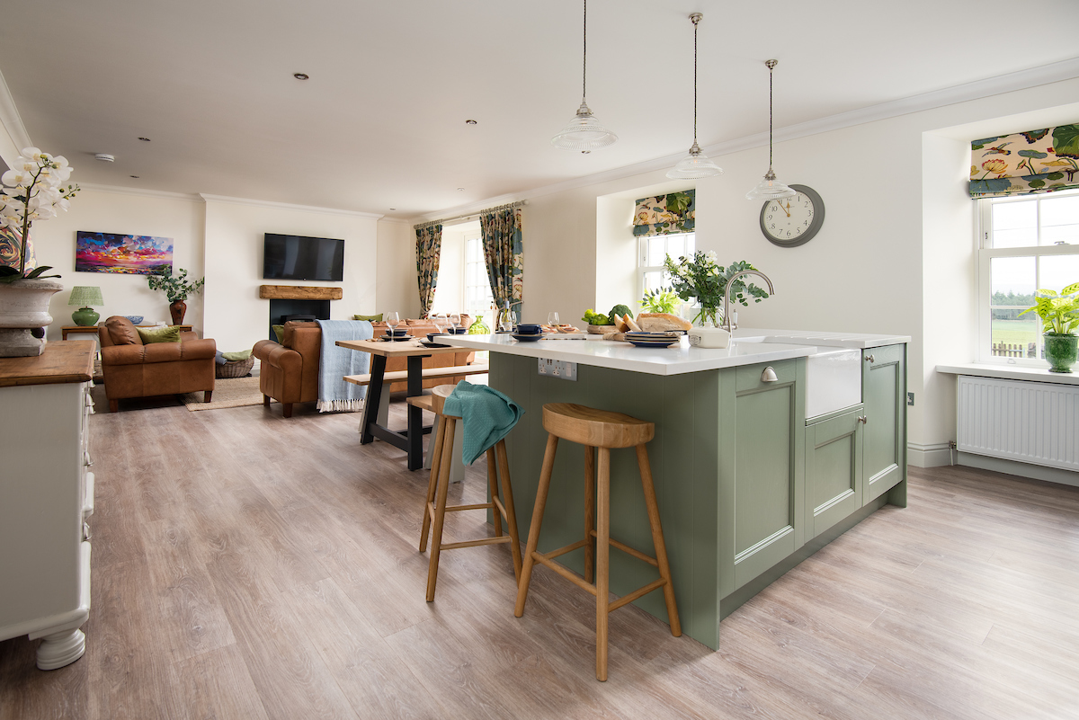 Quickslide supplies uPVC sliding sash windows and French doors, enhancing the appearance and functionality of a holiday cottage near Kelso, Scotland.