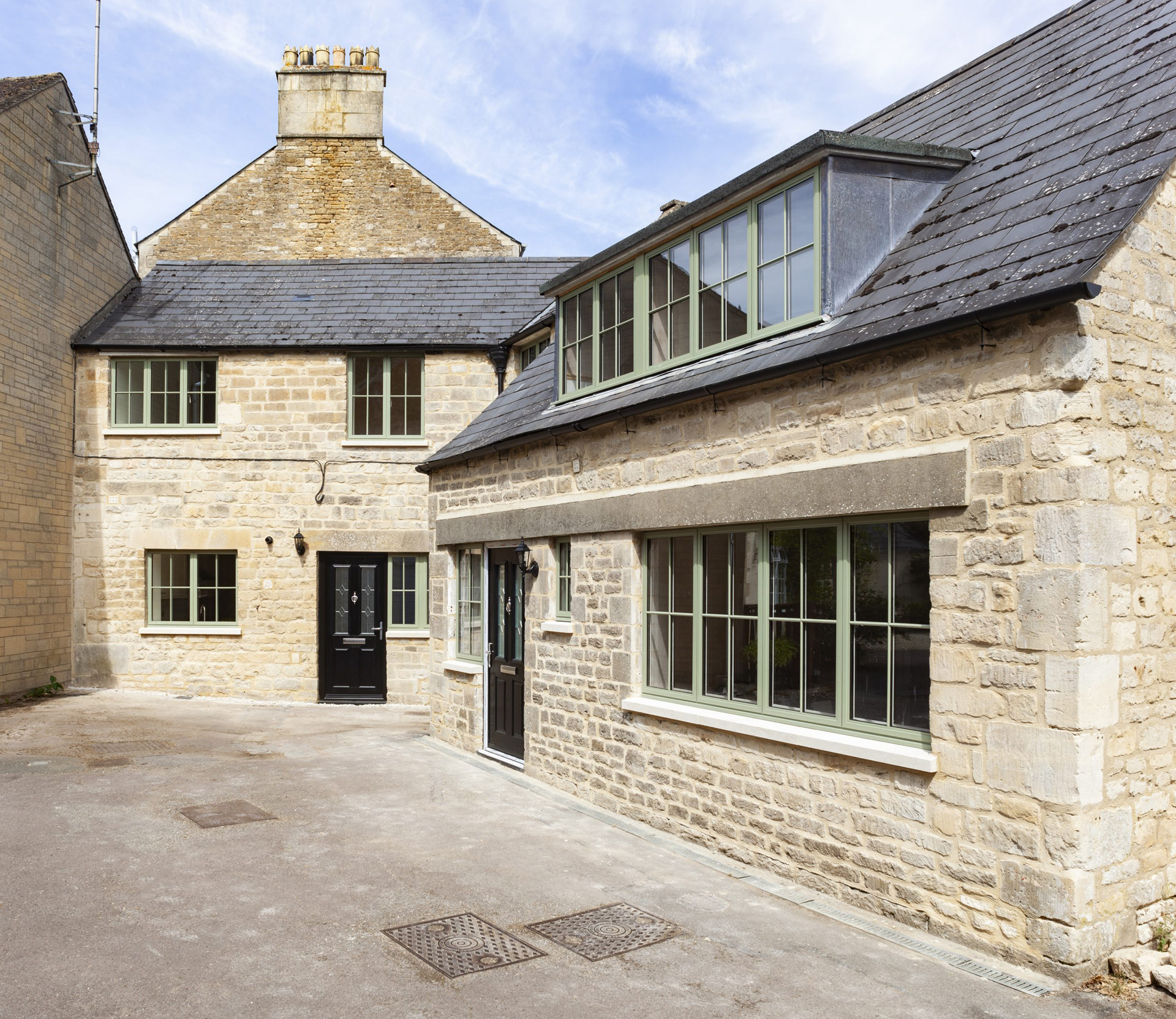 Green traditional aluminium casement windows