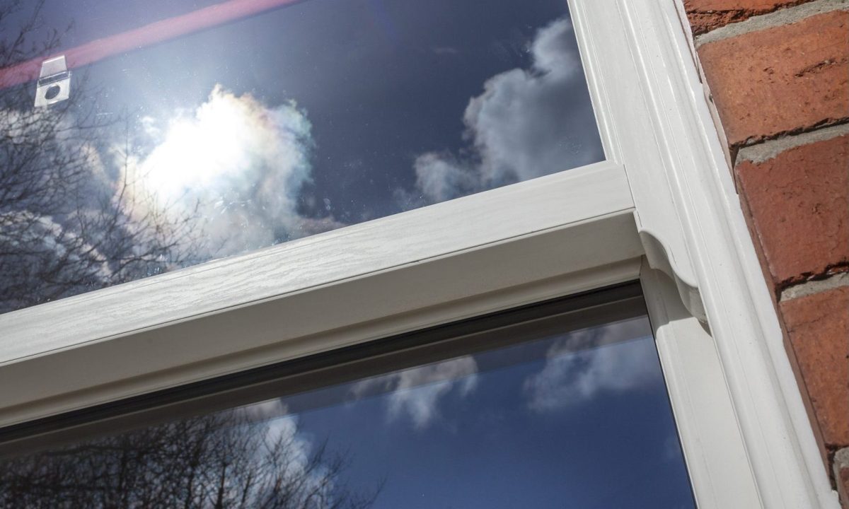 heritage sliding sash window in white woodgrain
