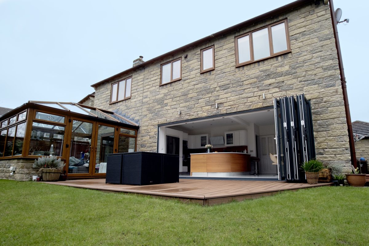 Black & White Aluminium Bifold Doors: Stylish and modern image showcasing sleek aluminium bifold doors, perfect for contemporary home designs.