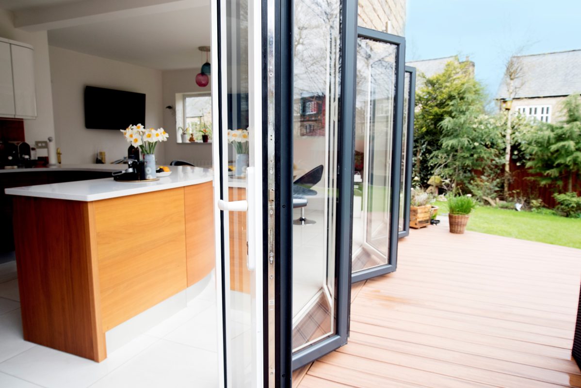 Aluminium Bifold Doors in Black & White: Explore the elegance of black and white aluminium bifold doors, offering a chic and versatile solution for your living space.