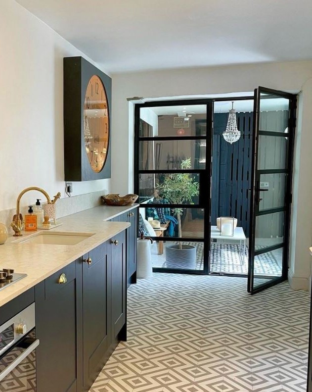 Classic aluminium doors with a heritage design, perfect for adding a touch of elegance to any architectural setting.