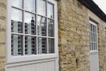 Which windows are ideal for cottage-style homes?