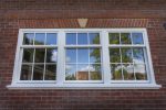 How do sliding sash windows save energy?
