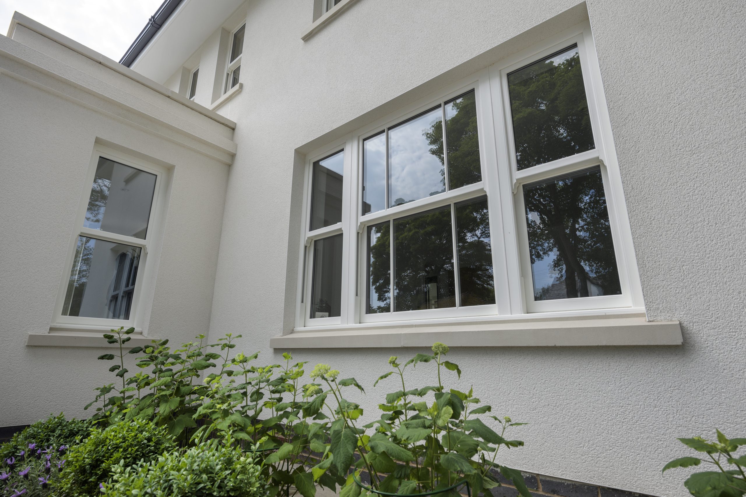 Combination of traditional elegance and modern functionality in windows.