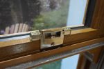 Robust security keep designed to enhance window safety and stability.