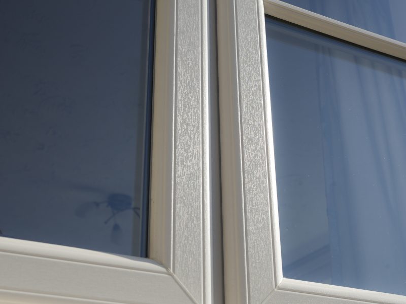 Close-up view of a uPVC window showcasing its elegant sculptured profile design