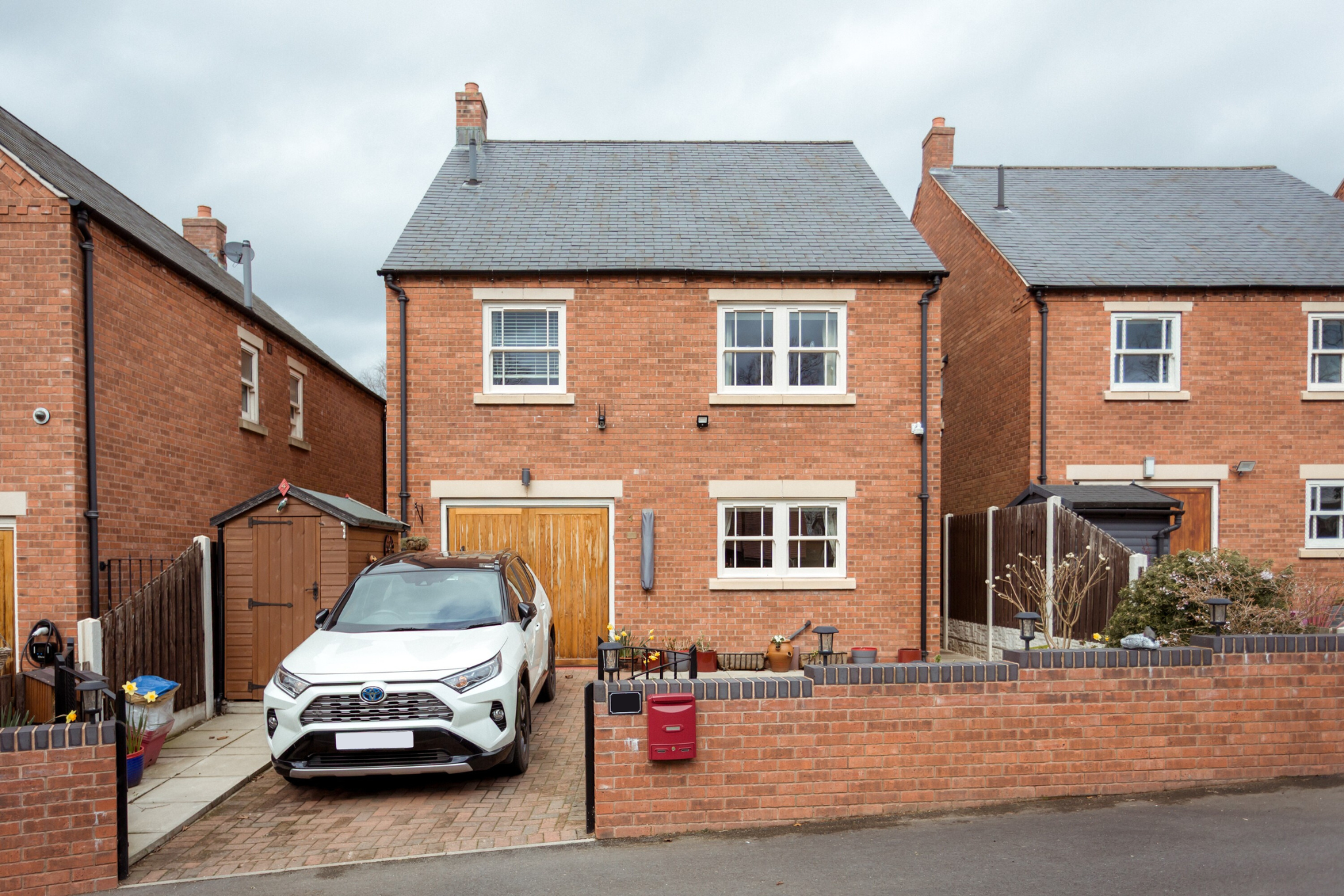 Bolsover property fitted with cream Legacy VS sash windows for enhanced thermal efficiency and heritage compliance