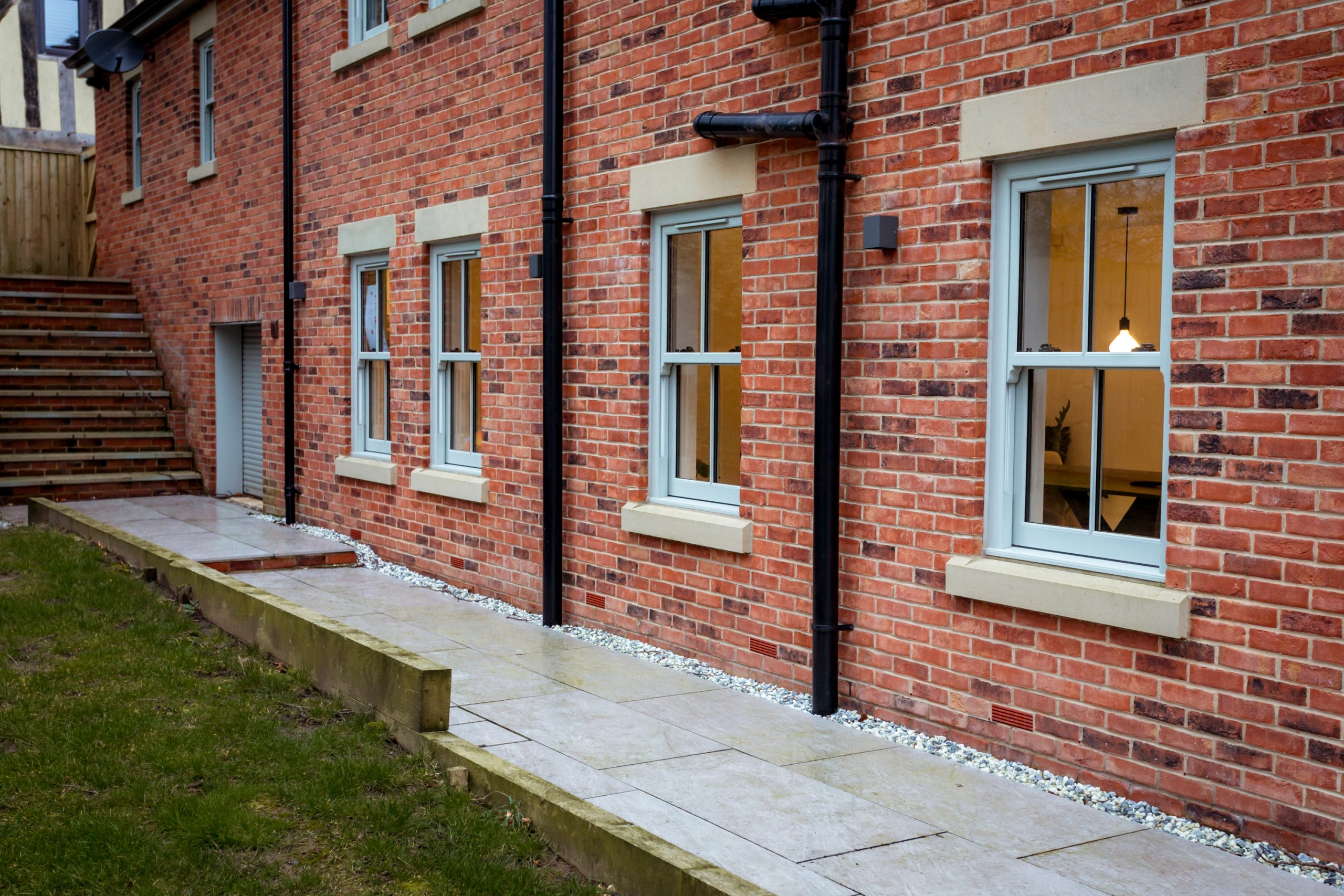 Two large detached houses built by AJ Roberts with Quickslide sash windows throughout