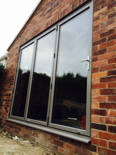 Dark grey closed aluminium bifold doors