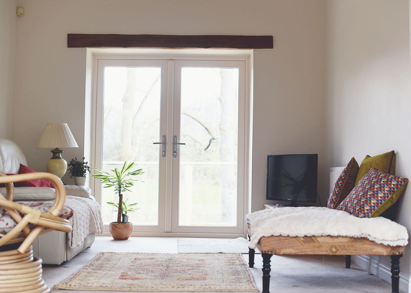 Swan and classic lever handles, hinges, and multi-point locking system for doors