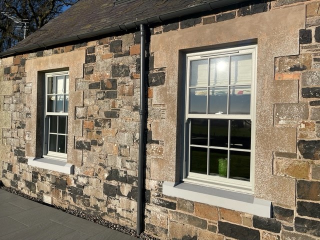 Quickslide’s uPVC sash windows and French doors give a sleek, modern look to a Kelso holiday cottage