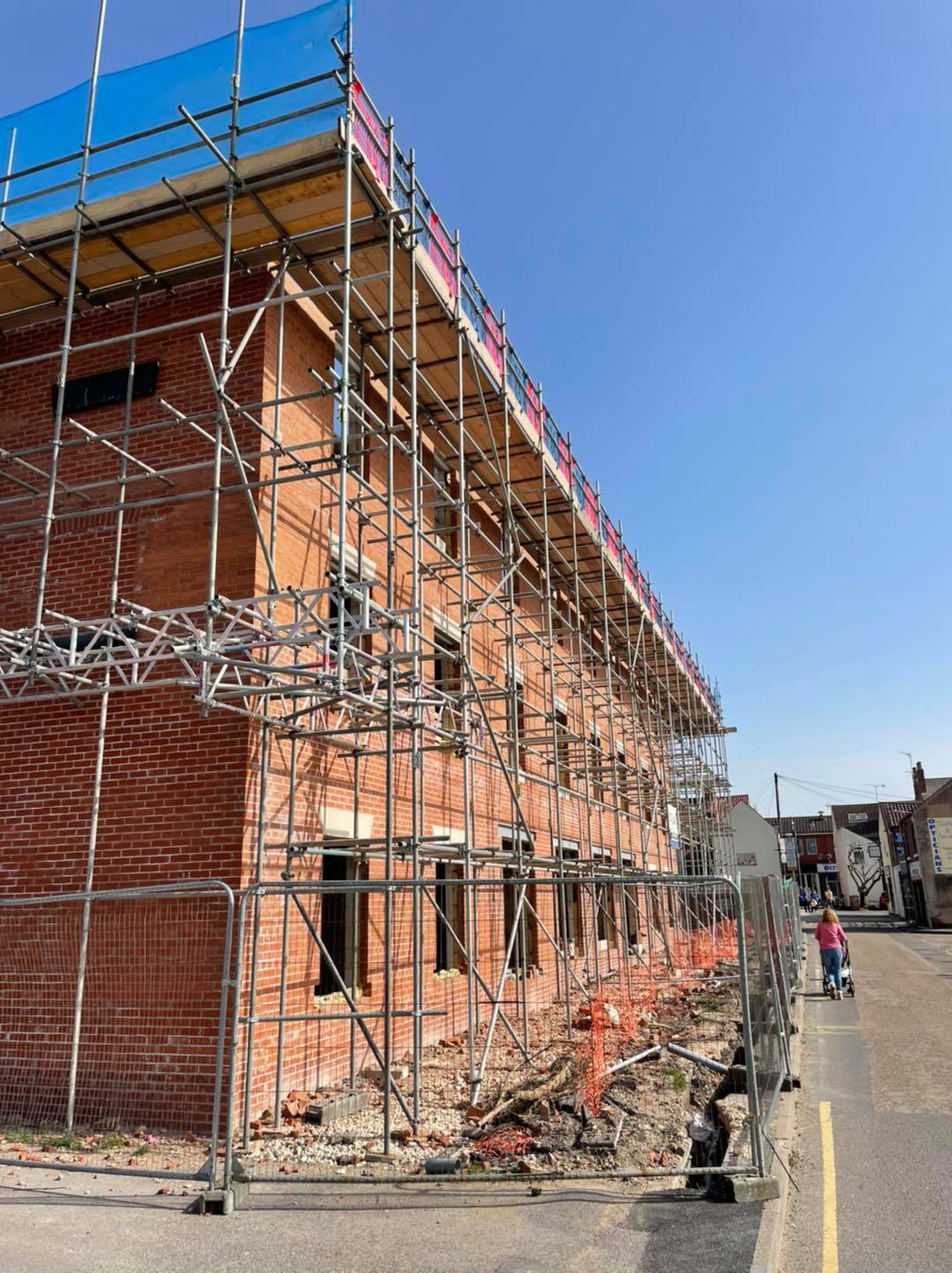 Quickslide's PVC-U sliding sash windows provide traditional style and secure new apartments.