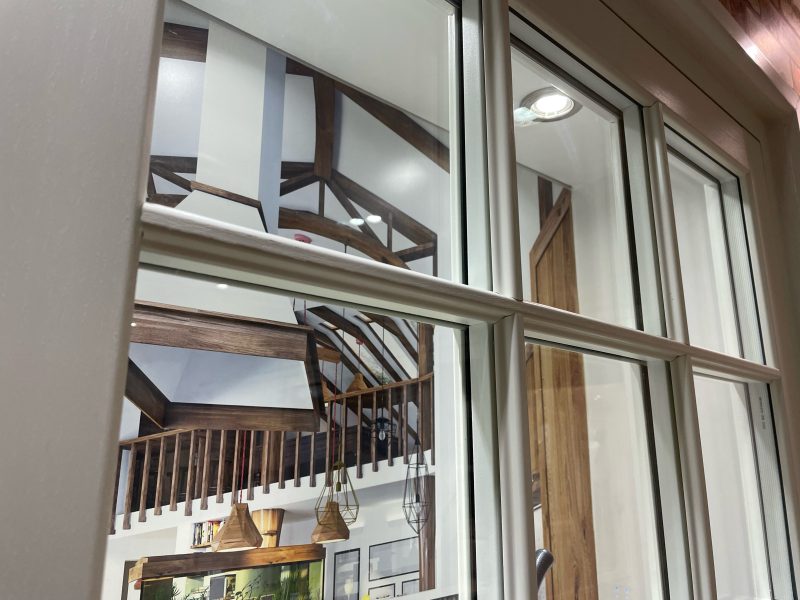 uPVC window featuring astragal bars, configured horizontally and vertically for a traditional, Victorian-style design