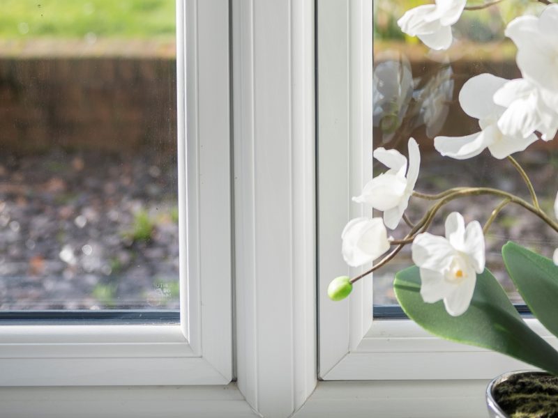 Close-up of the minimalistic internal frame detail of a uPVC flush sash window, blending seamlessly with interior decor