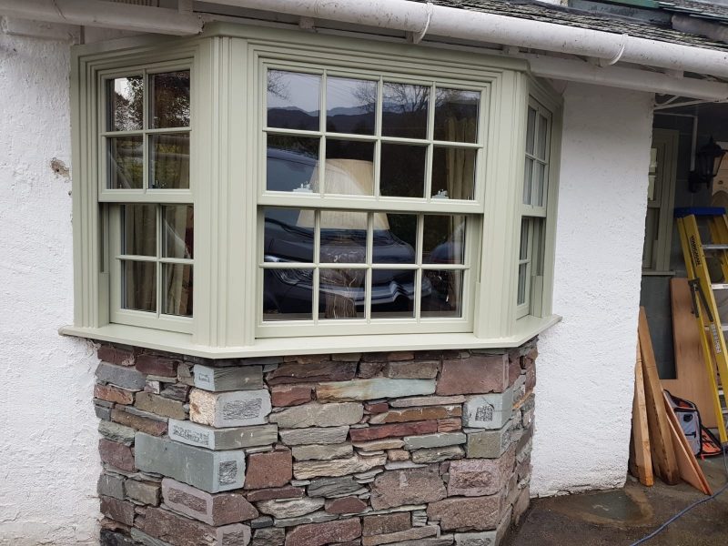 Woodgrain Sliding Sash Bay Windows by Quickslide