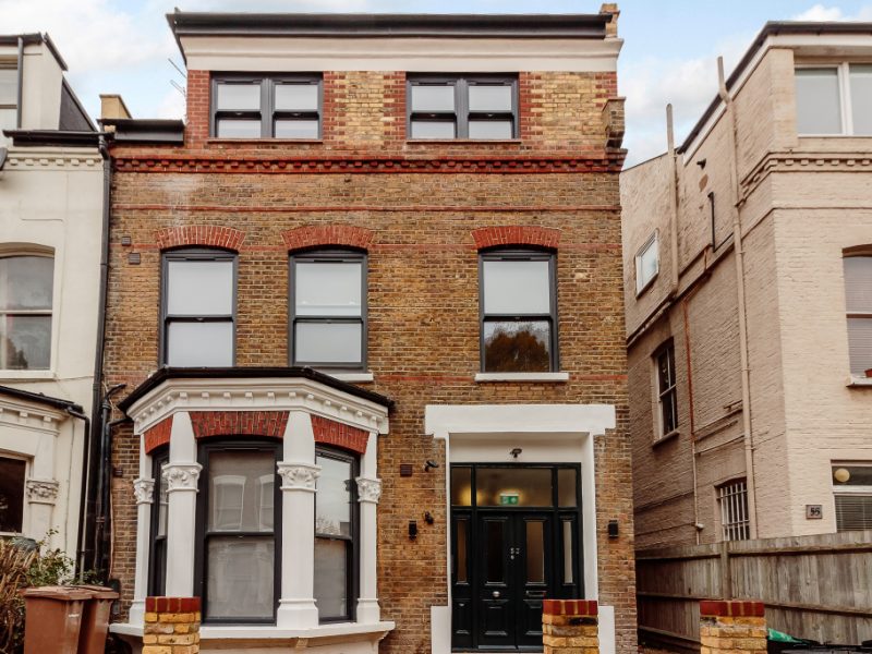 Sliding Sash Bay Windows in Black Woodgrain uPVC London