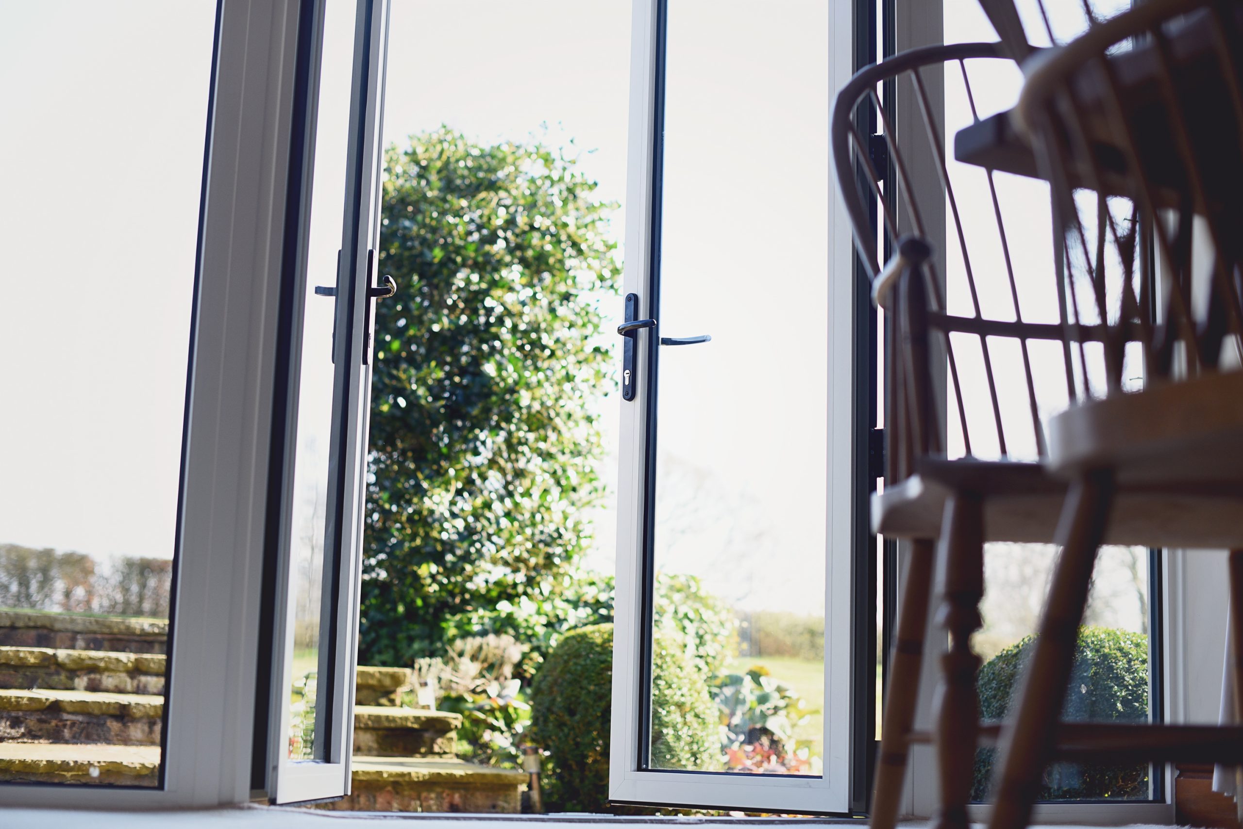 High-quality, in-house manufactured aluminium French doors, offering durability and quick lead times