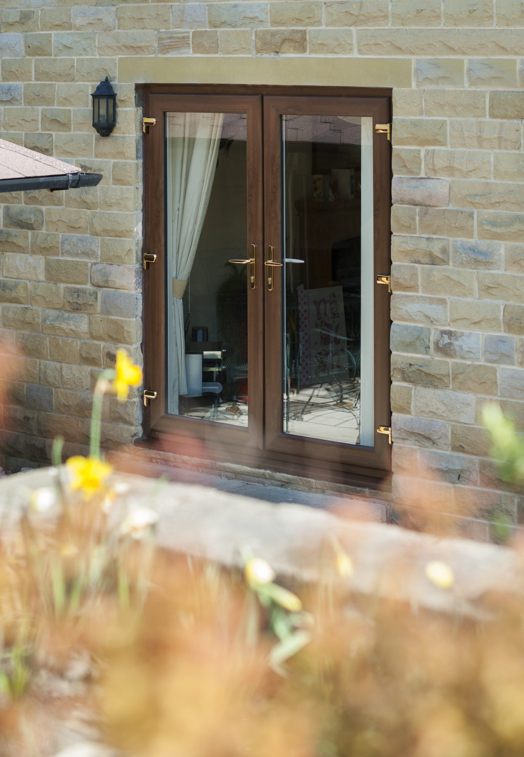 uPVC French doors with side light configuration, letting in extra natural light