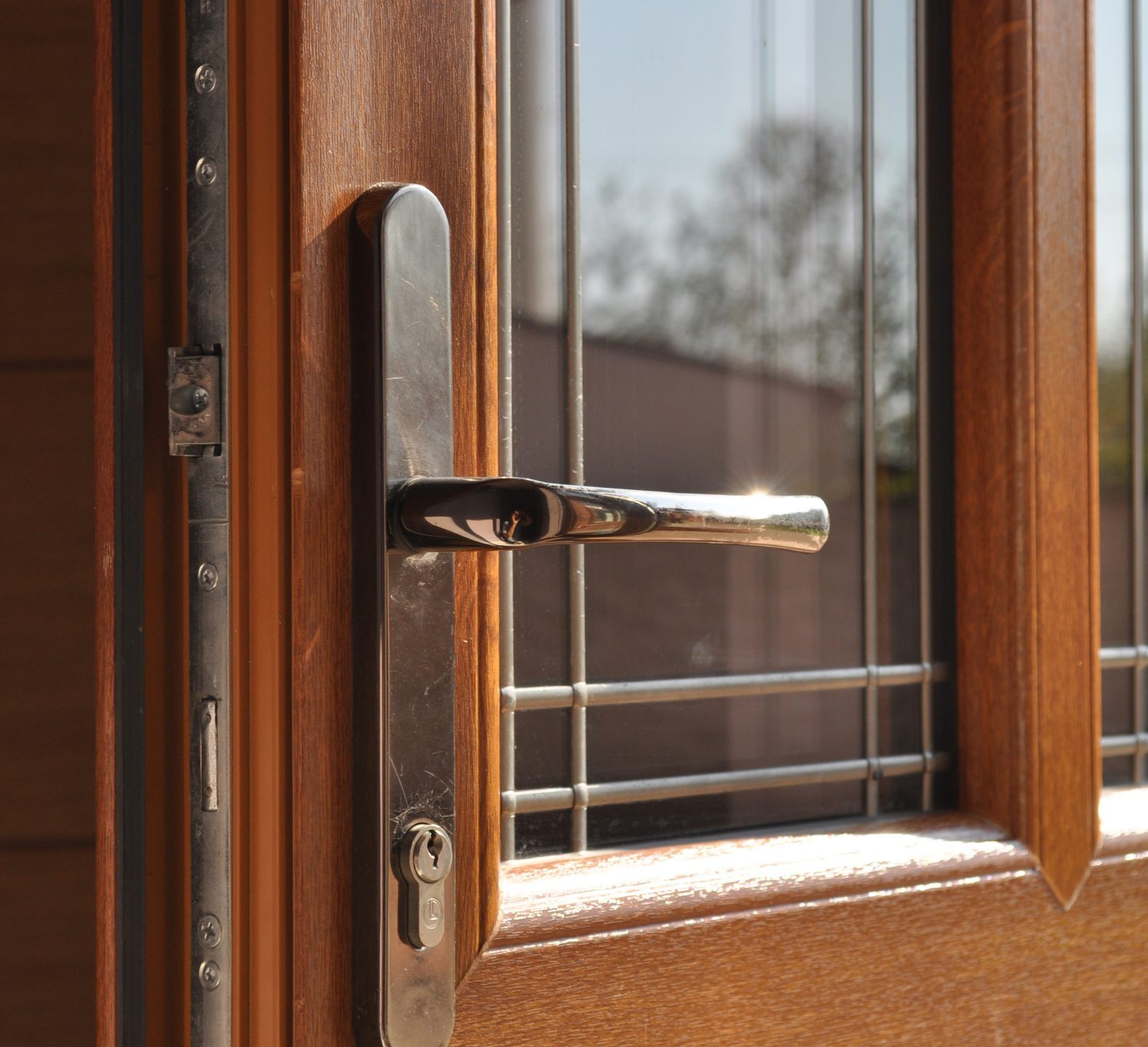 Explore a range of high-quality hardware options for your uPVC panel doors, offering both style and security