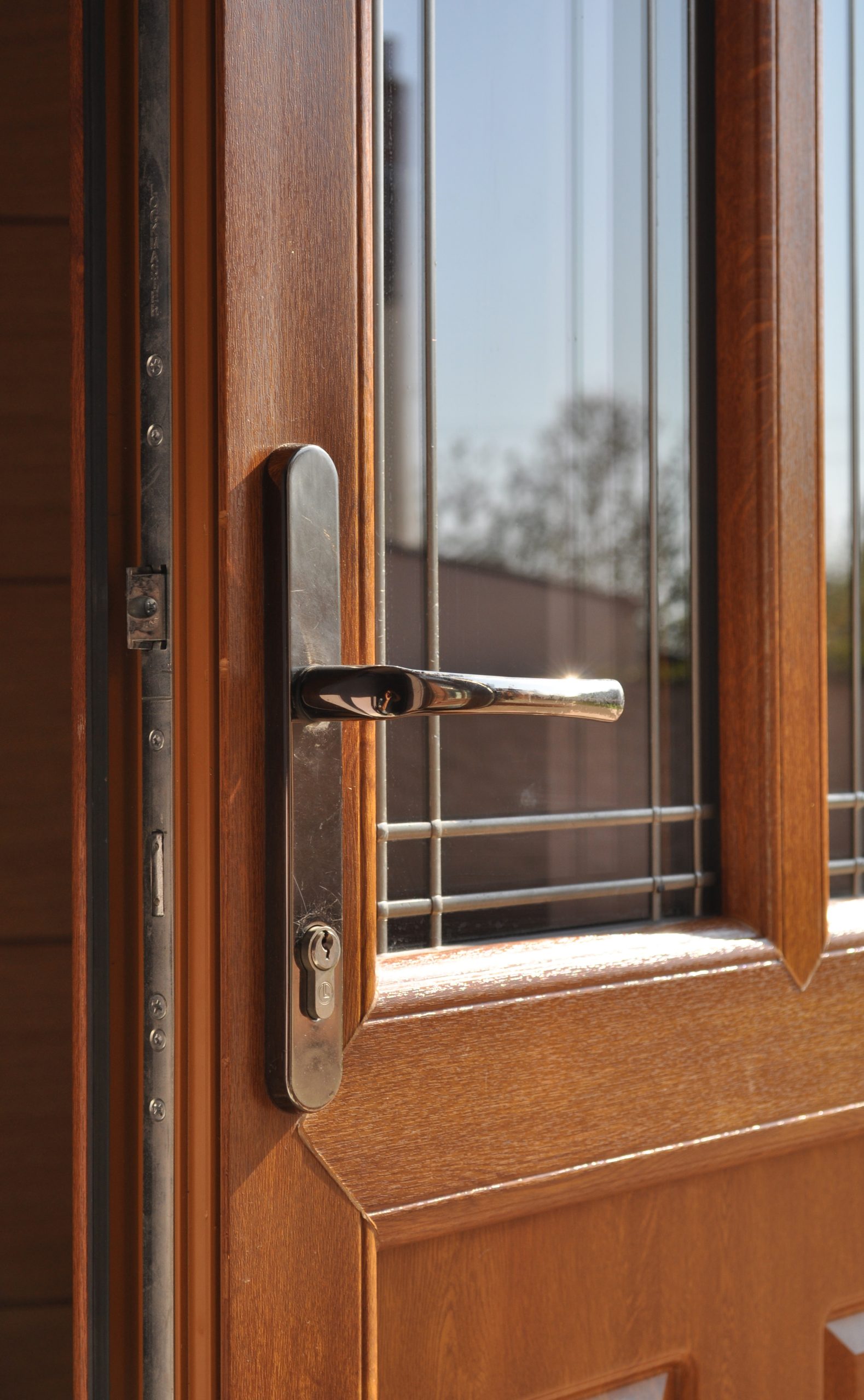 Explore a range of high-quality hardware options for your uPVC panel doors, offering both style and security