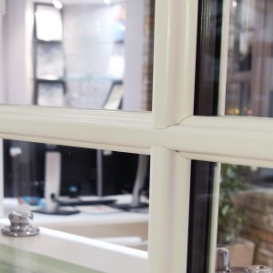 Close-up of astragal bars on uPVC French doors, adding a traditional aesthetic to the design