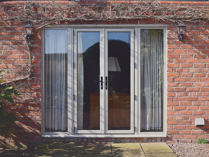 Add natural light and style with side and top light configurations for your aluminium French doors