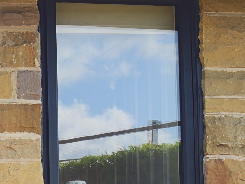 Close-up view highlighting the design and craftsmanship of an aluminium casement window