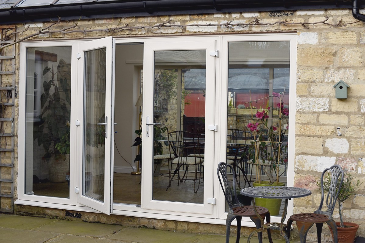 Detailed view of classic lever handles on uPVC French doors for a stylish finish