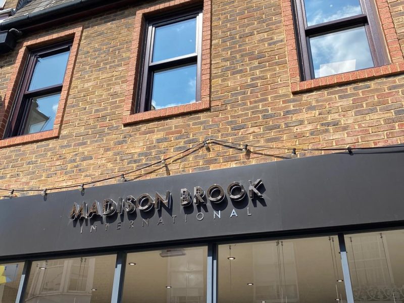 Dark woodgrain sash windows