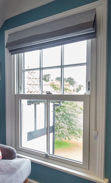 White uPVC Edwardian style sliding sash window