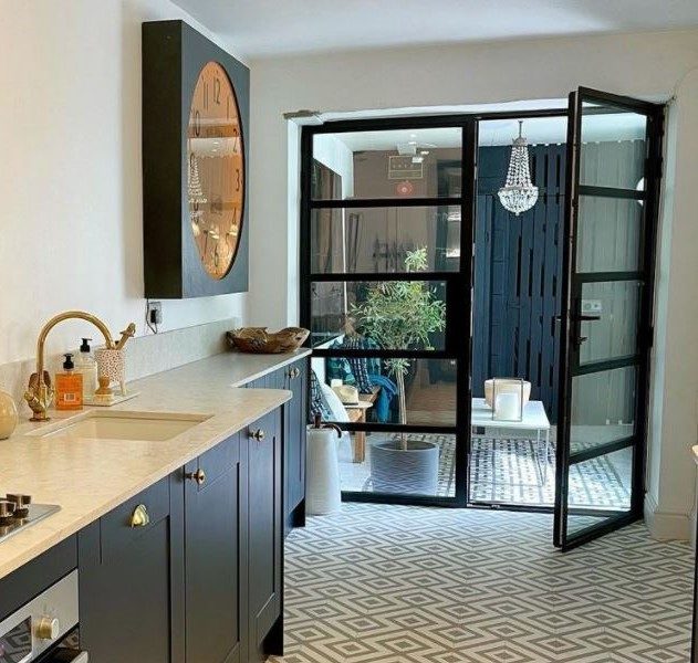 Heritage-style aluminium doors with slim sightlines installed in a classic brick property