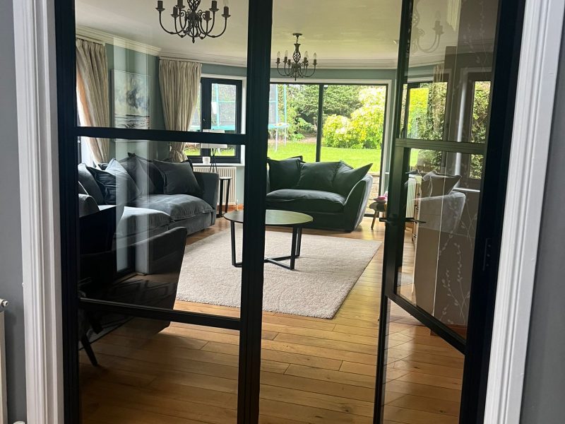 Modern AluSpace doors and screens enhance any interior, offering sleek design and durability