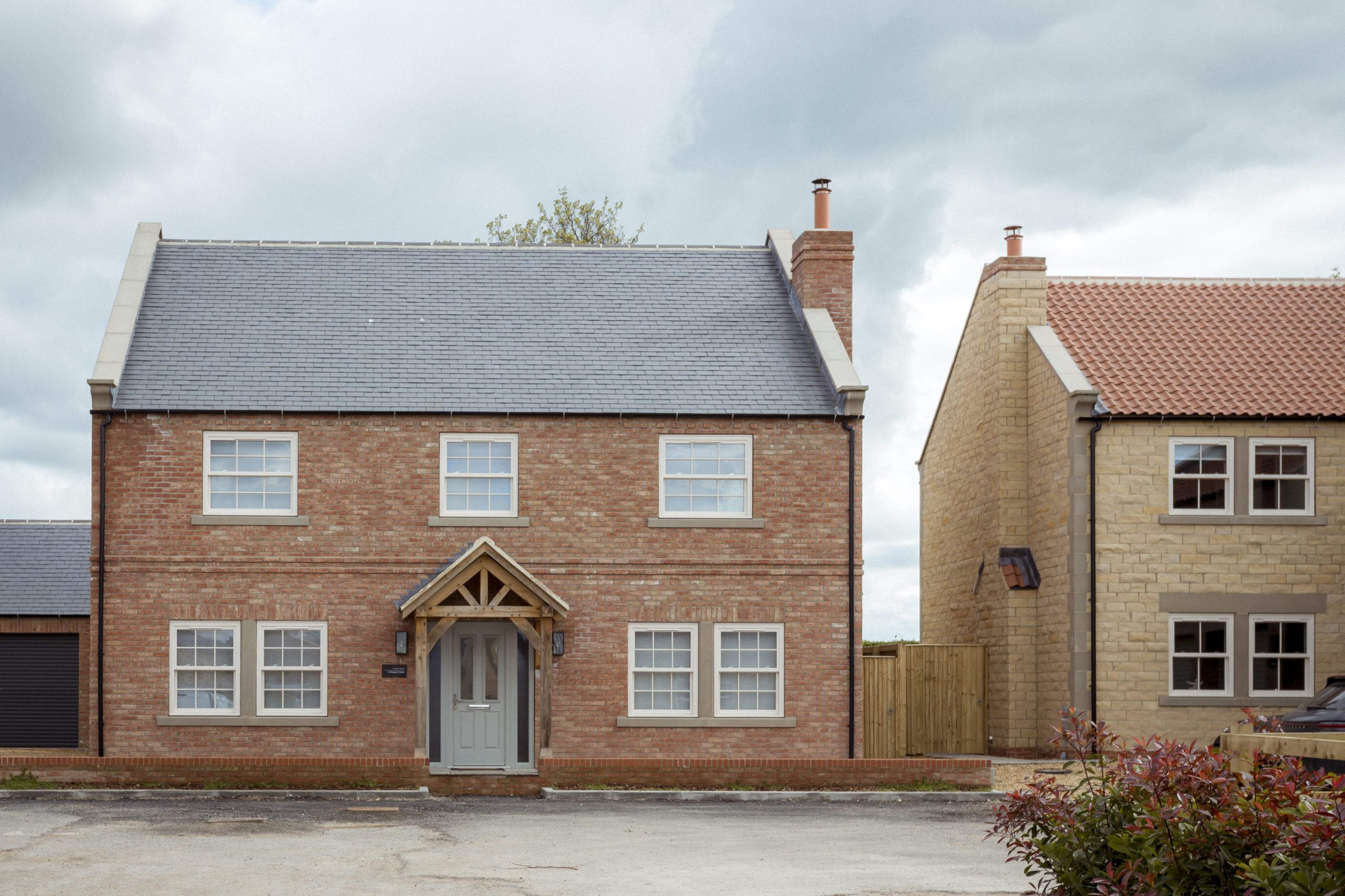 Indulge in the opulence of Palladian Homes' traditionally styled windows, enhancing the allure of luxury living.