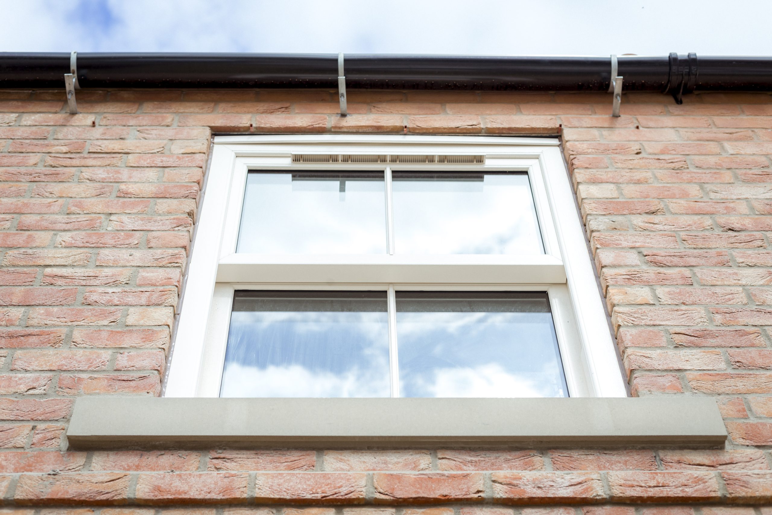 Enjoy the timeless elegance of Palladian Homes' traditionally styled windows, a hallmark of luxury living