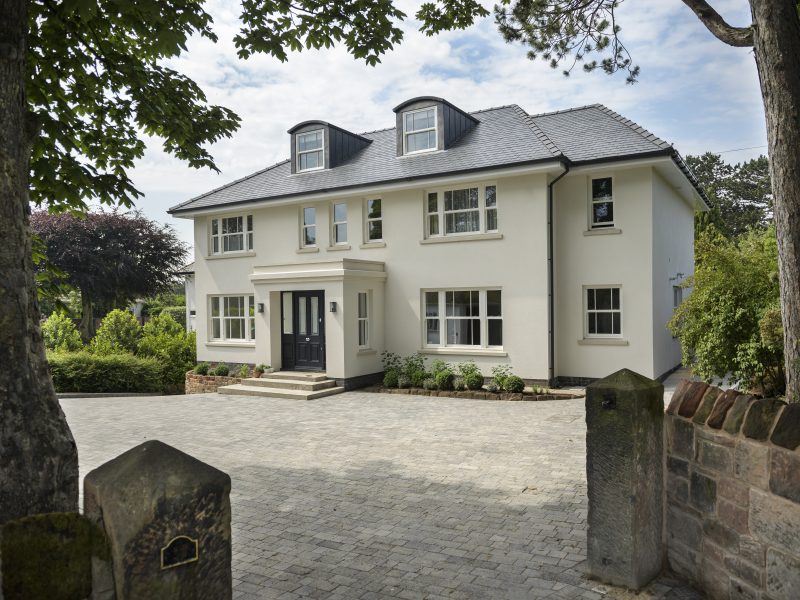 Traditional sliding sash windows enhancing a modern home's character.