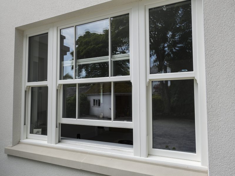 uPVC sliding sash windows offering practical beauty for coastal homes.