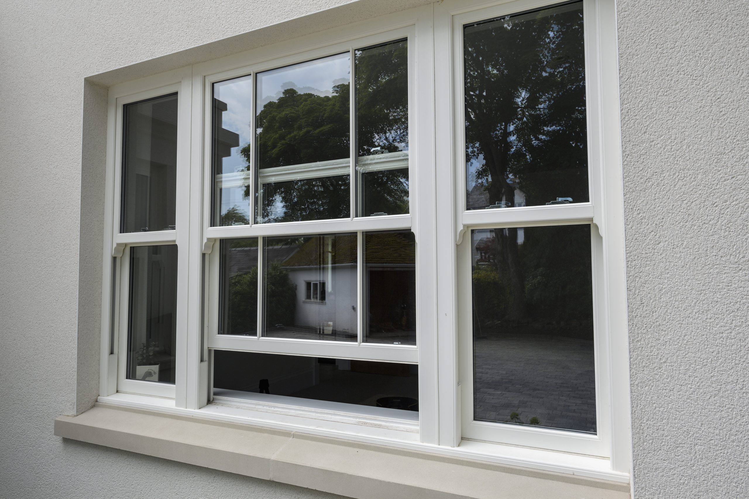 uPVC sliding sash windows offering practical beauty for coastal homes.