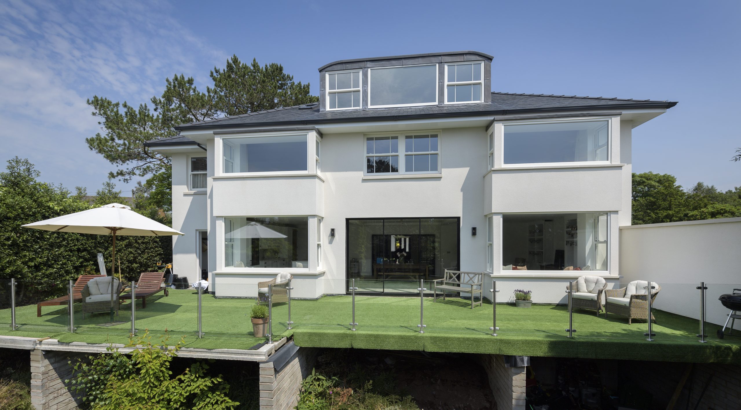 Traditional sliding sash windows providing charm to a modern conversion.