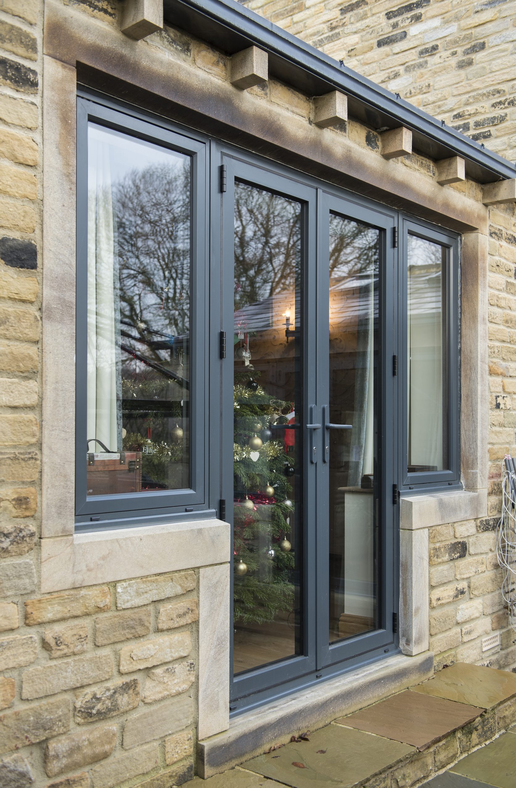 Quickslide aluminium flush sash windows and heritage doors with bespoke front options for a stylish home upgrade