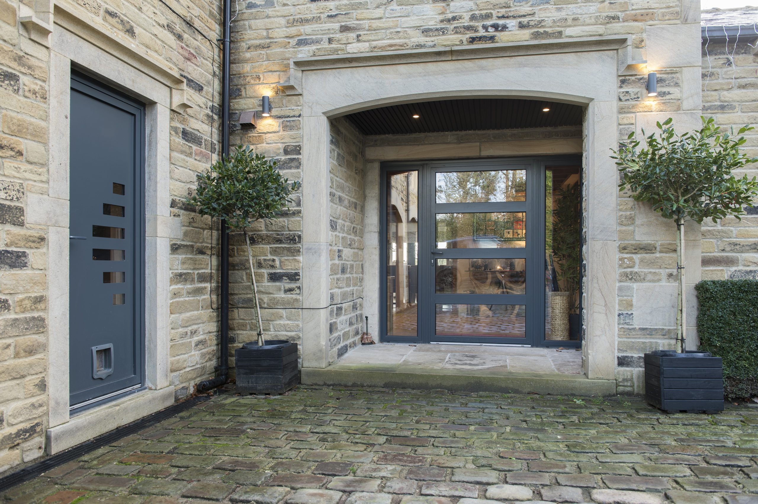 Quickslide aluminium flush sash windows, heritage doors, and bespoke fronts for quality home renovation projects
