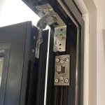 Steel Door Hinge on a black french door