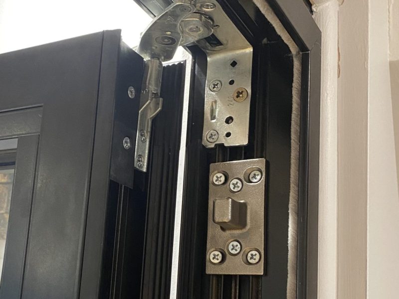 Steel Door Hinge on a black french door