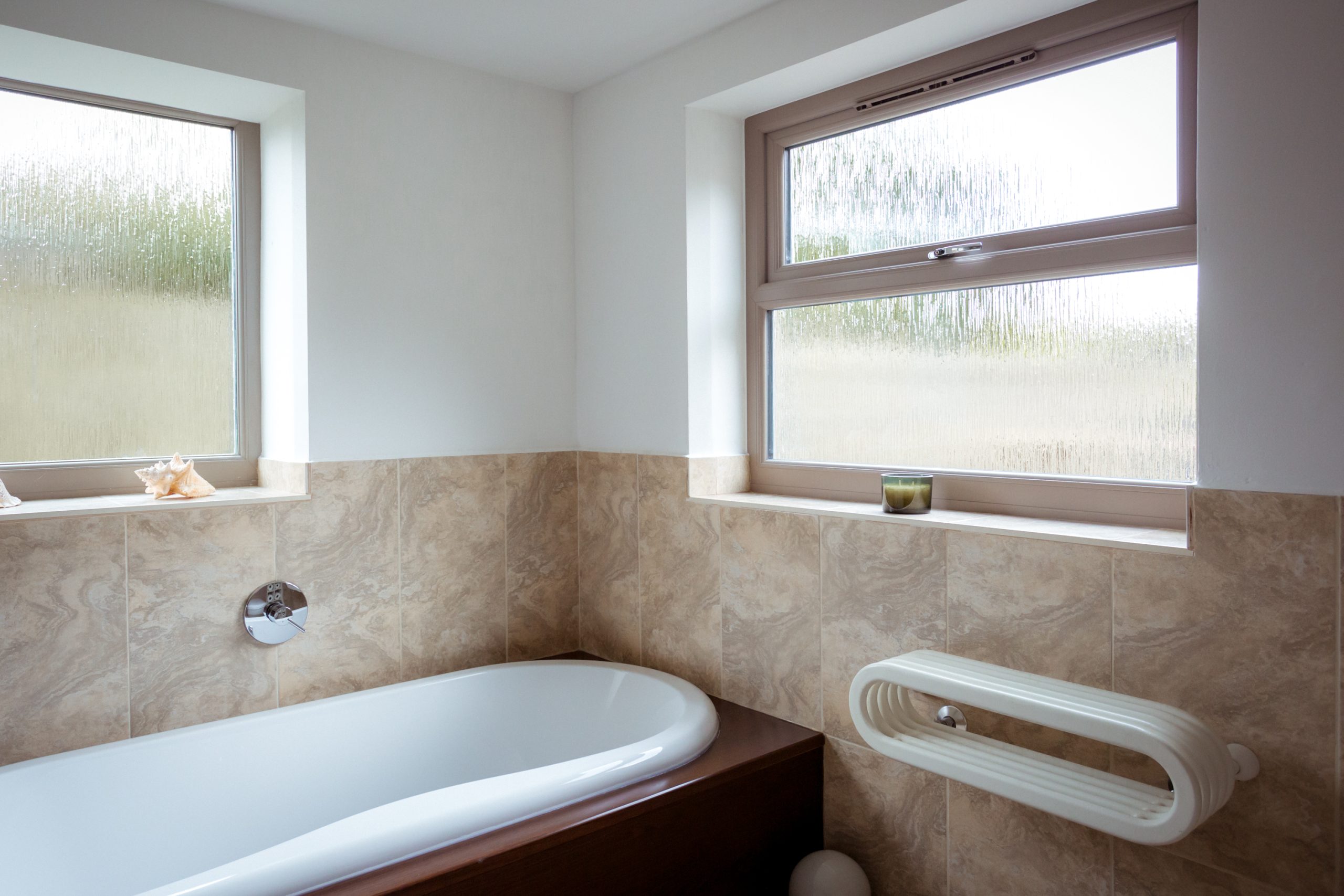 A customer's review highlighting Quickslide's bespoke windows and doors