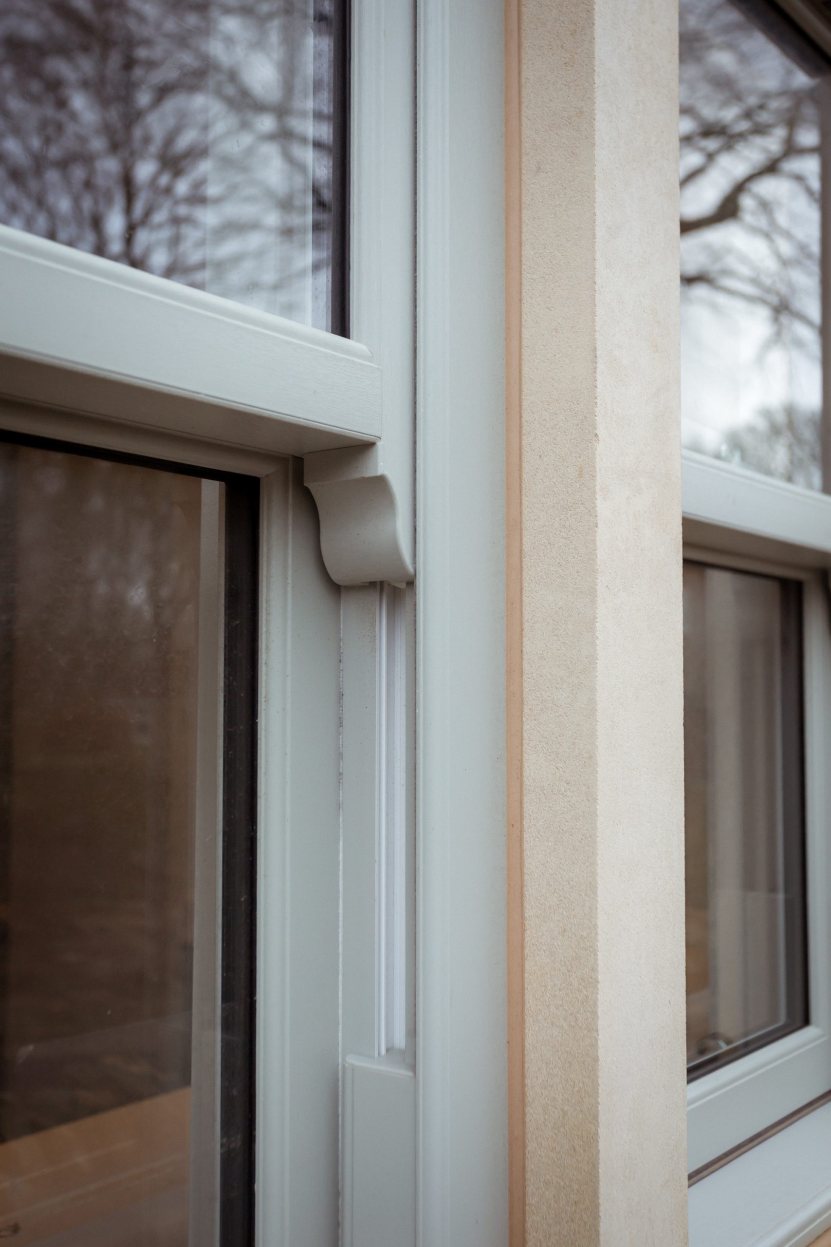 Traditional farmhouse with Quickslide windows that match its period charm