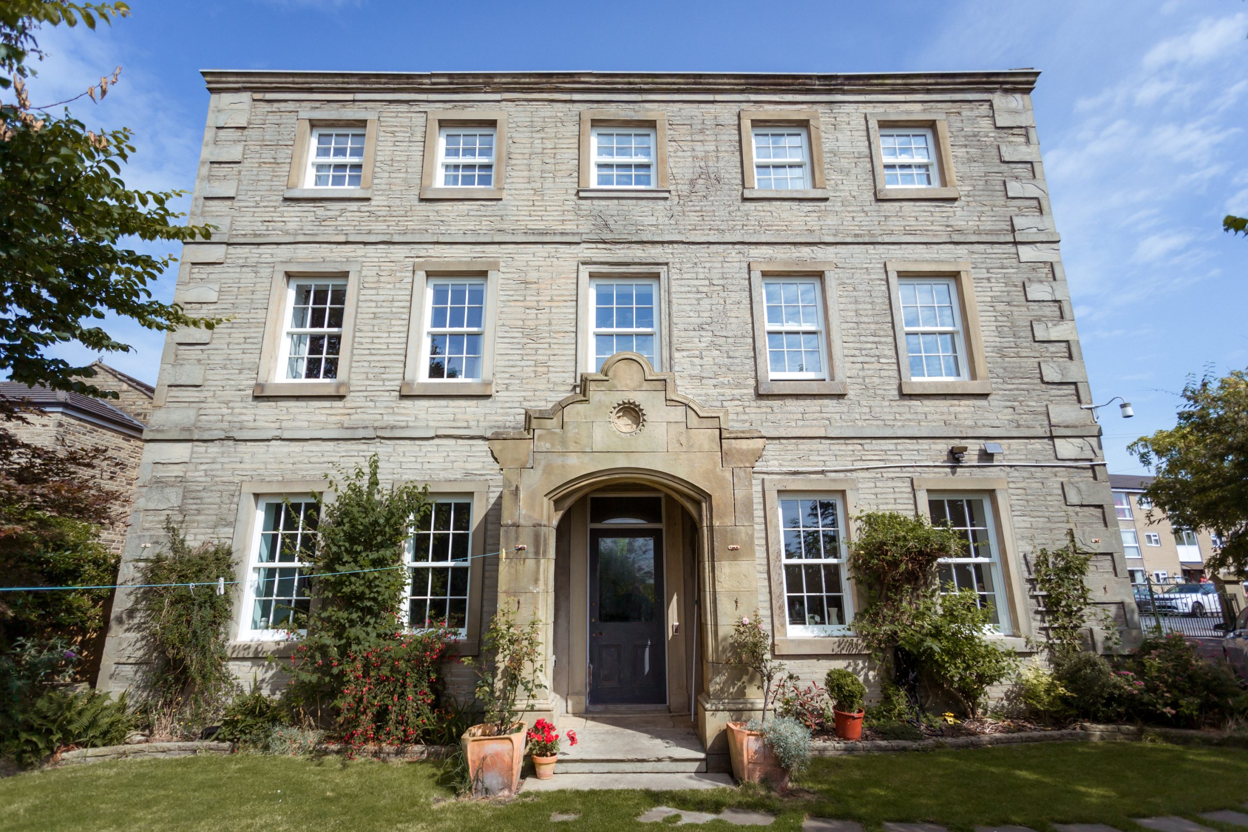 Exterior view of the Georgian property with newly installed Quickslide windows