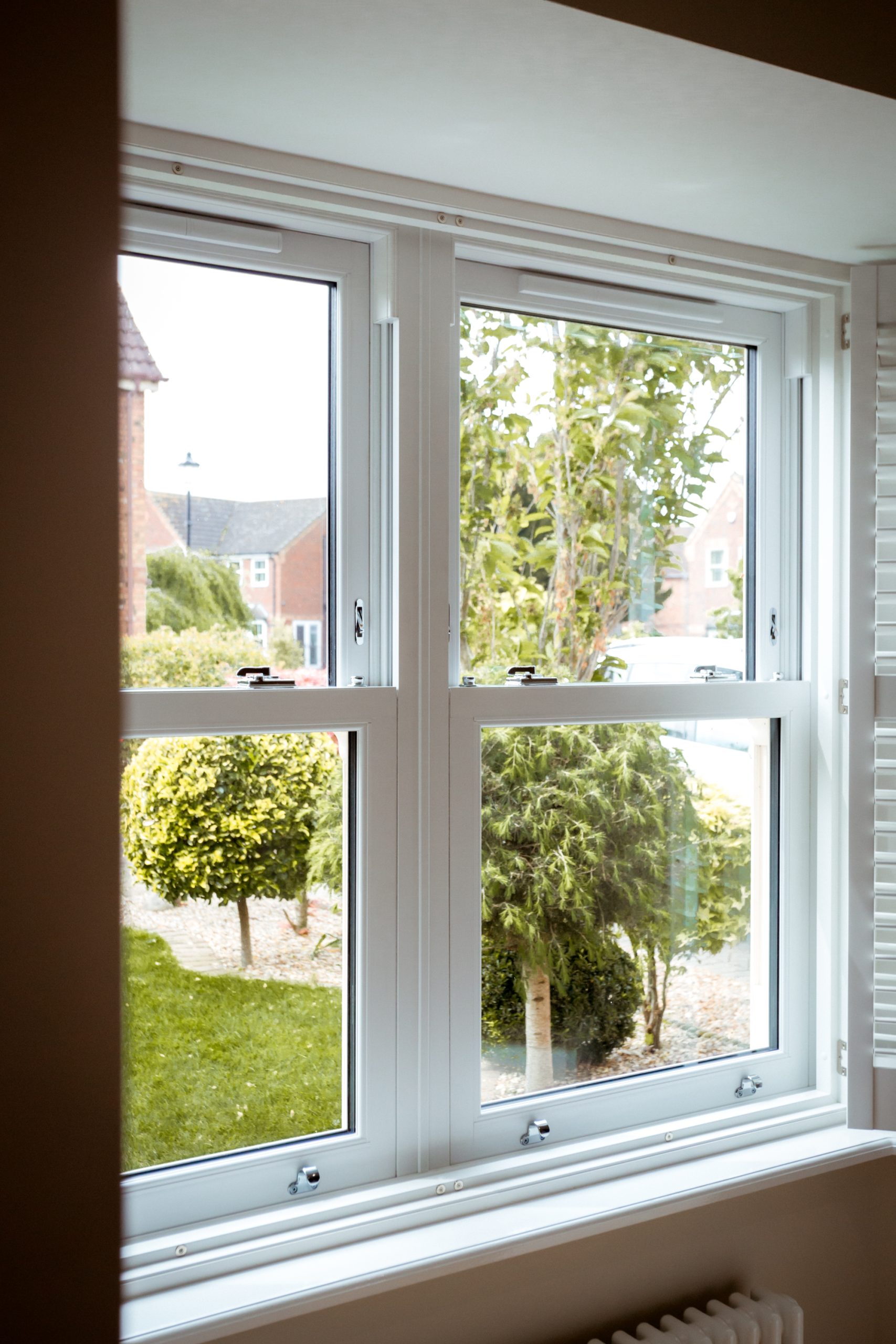 Description of a successful project where Highseal installed 24 Legacy uPVC sliding sash windows