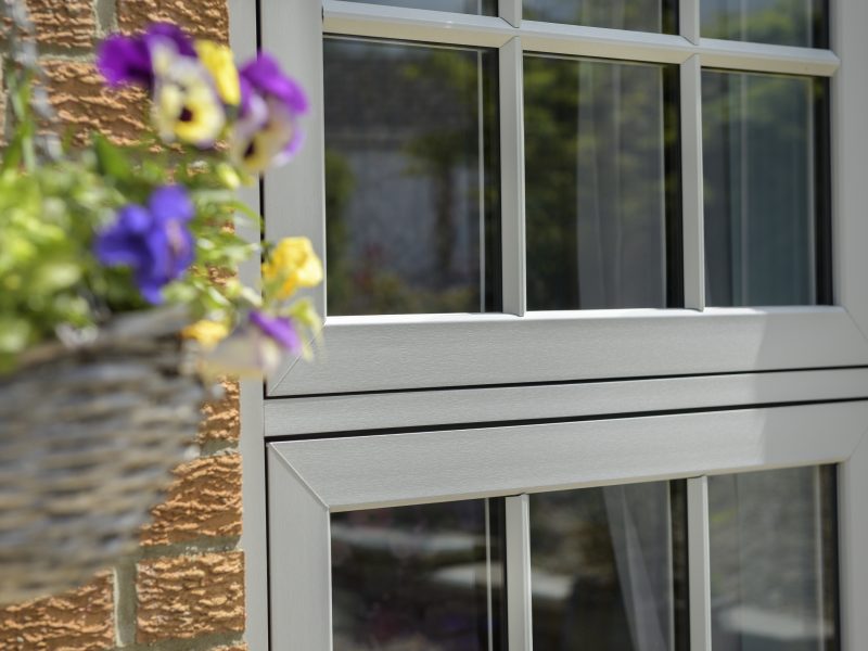 Flush-fitting uPVC casement window frame with sleek external contours