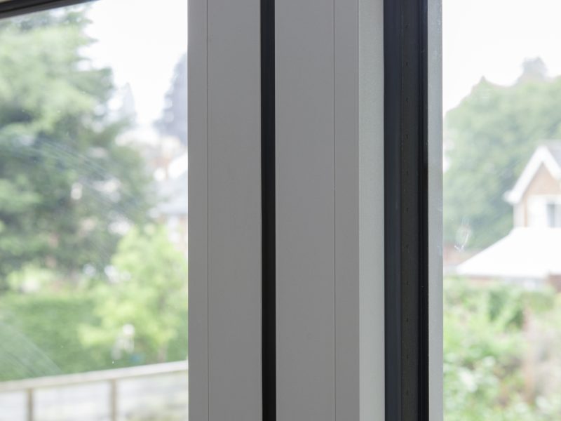 Close-up of the aluminium door's internal frame, highlighting its precision and strength